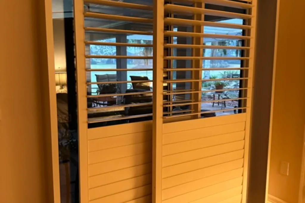 Bypass plantation shutters on sliding glass doors in a Del Webb Spruce Creek home, Summerfield FL