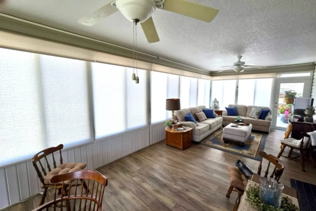 Solar roller shades in a bright Florida room in a Del Webb Spruce Creek home, Summerfield FL